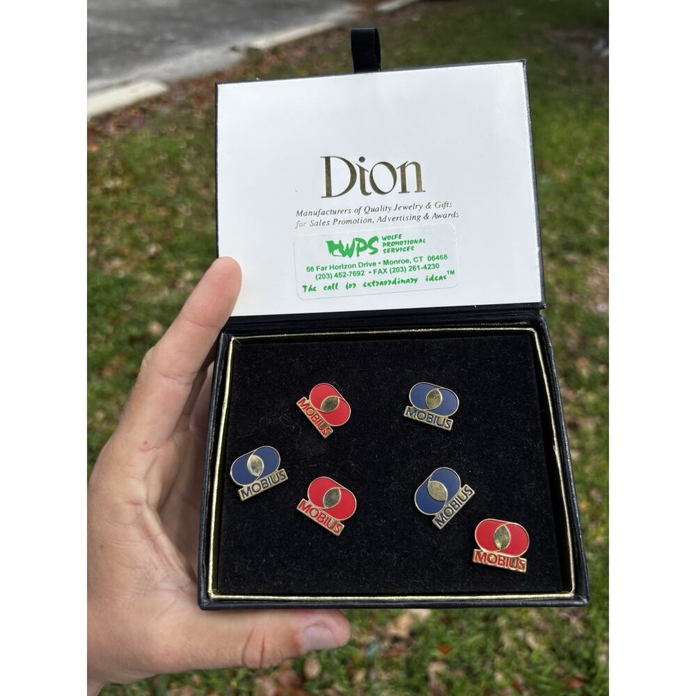 VINTAGE MÖBIUS COMPANY PINS BY DION